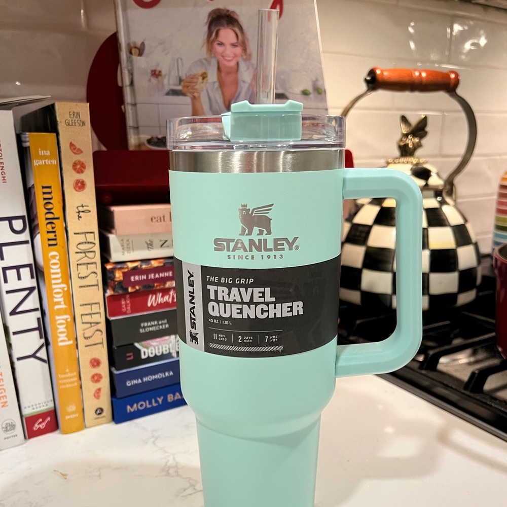 Brand new Stanley 40oz travel quencher in Mint with cover and straw